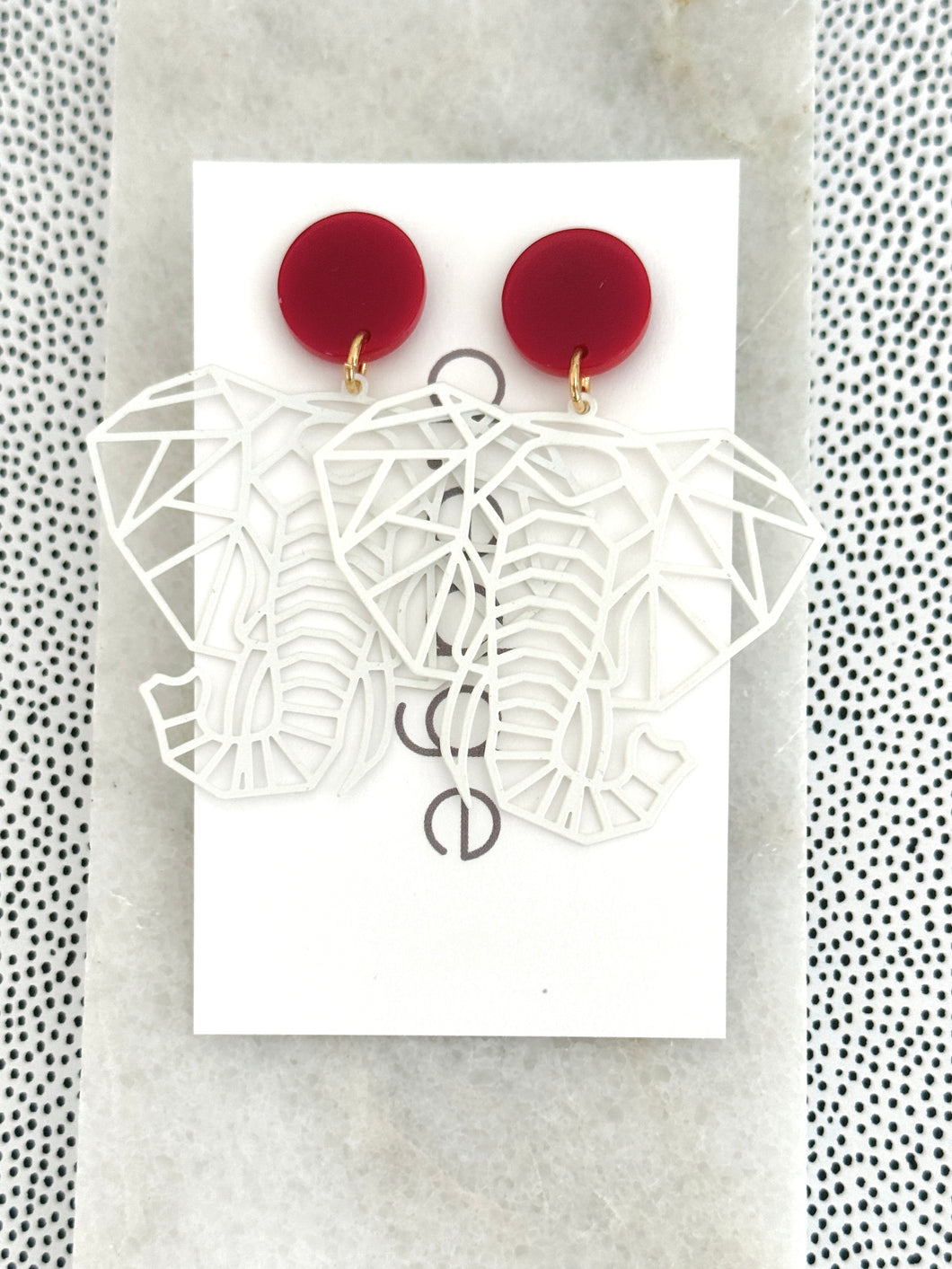 The White Filigree Elephant Earrings