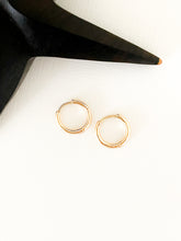 Load image into Gallery viewer, The Gold Filled Round Huggie Hoop Earrings
