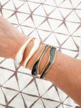 Load image into Gallery viewer, The Ebony or Ivory &amp; Gold Wave Cuff Bracelet
